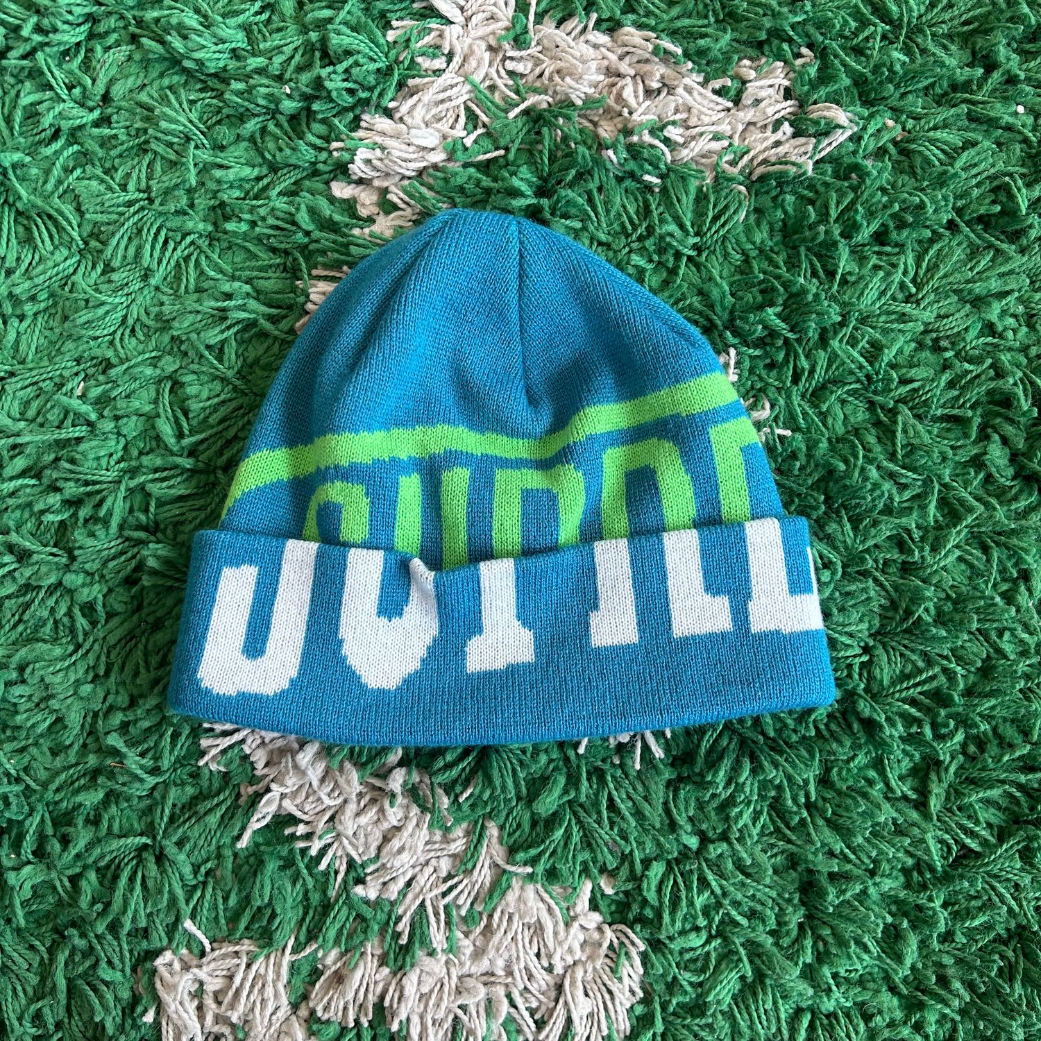 PO SUPREME NEW ERA 2 TONE LOGO BEANIE TEAL