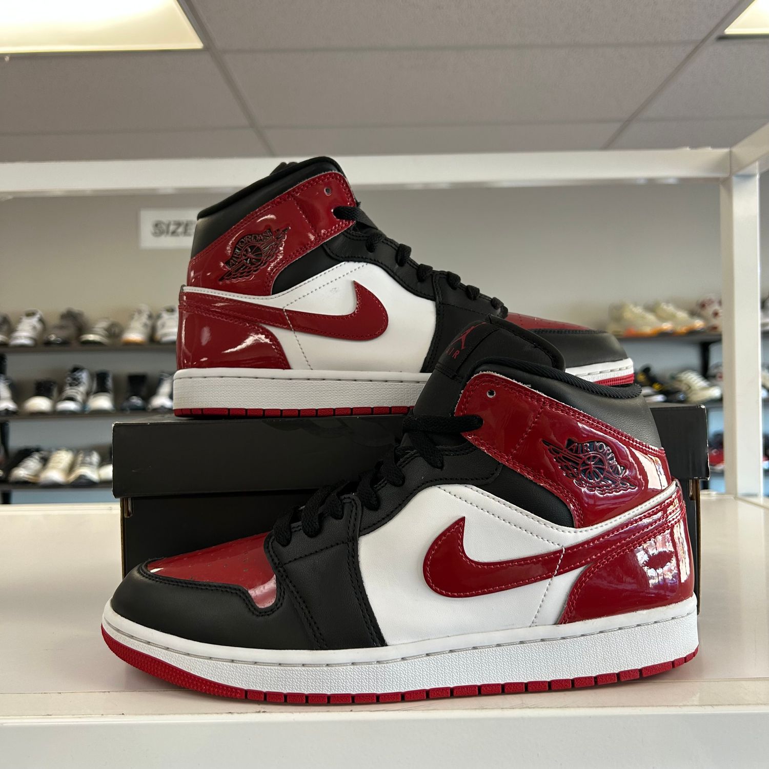 PO JORDAN 1 MID SE PATENT BRED TOE (SX) SIZE 10.5