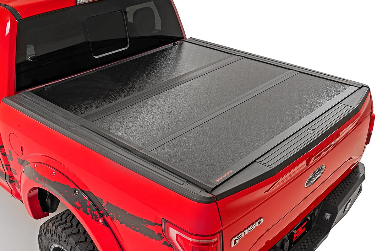 Dodge Low Profile Hard Tri-Fold Tonneau Cover (09-18 Ram 1500 | 5.5' Bed W/O Rambox)