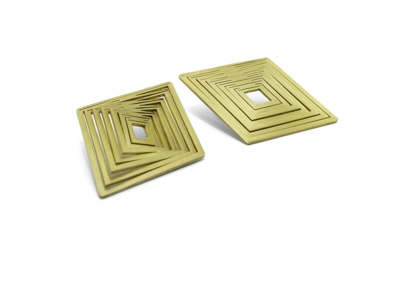 ORBITS diamond earrings -no frame-