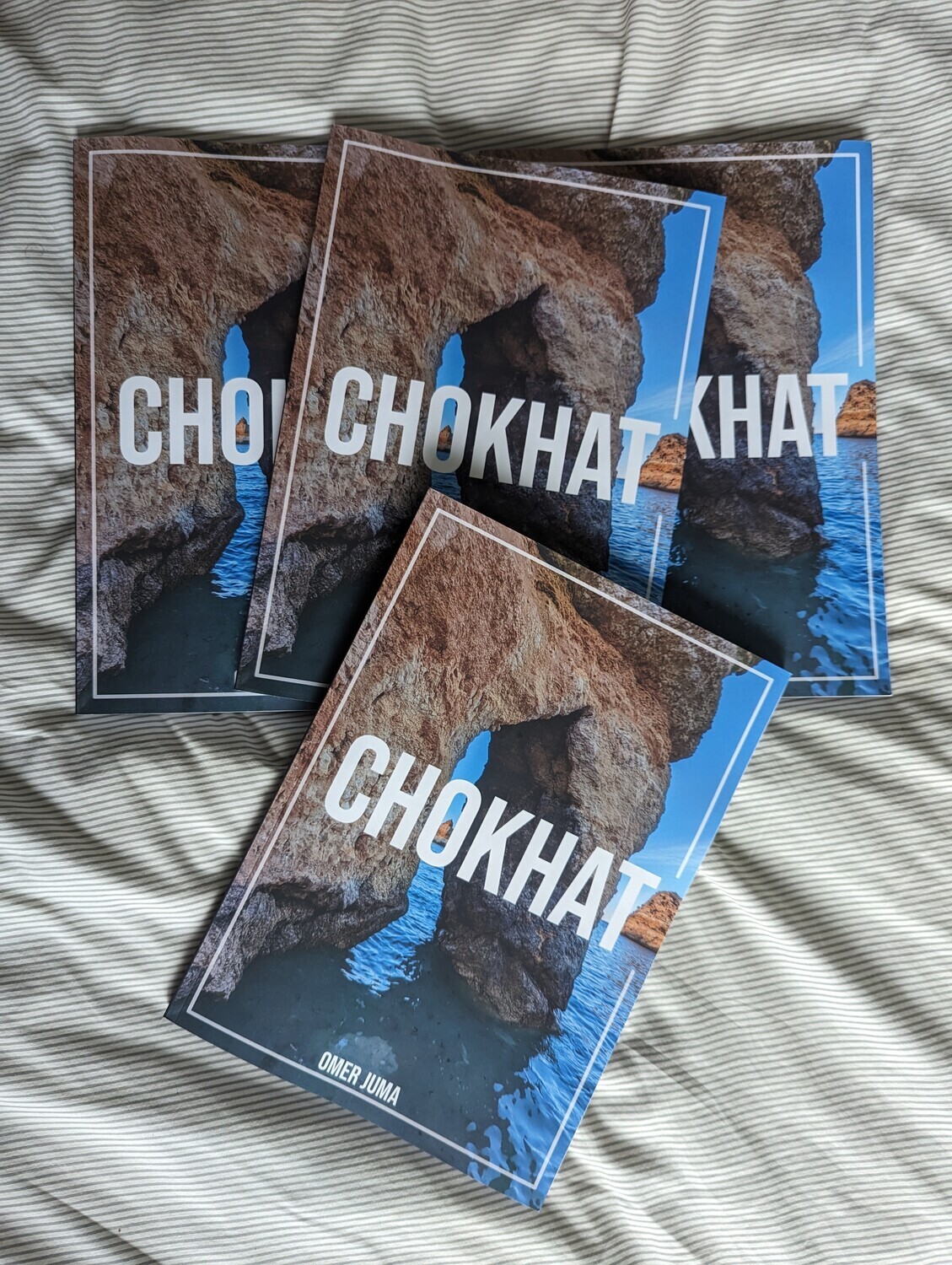 Chokhat (Frame) Photobook by Omer Juma