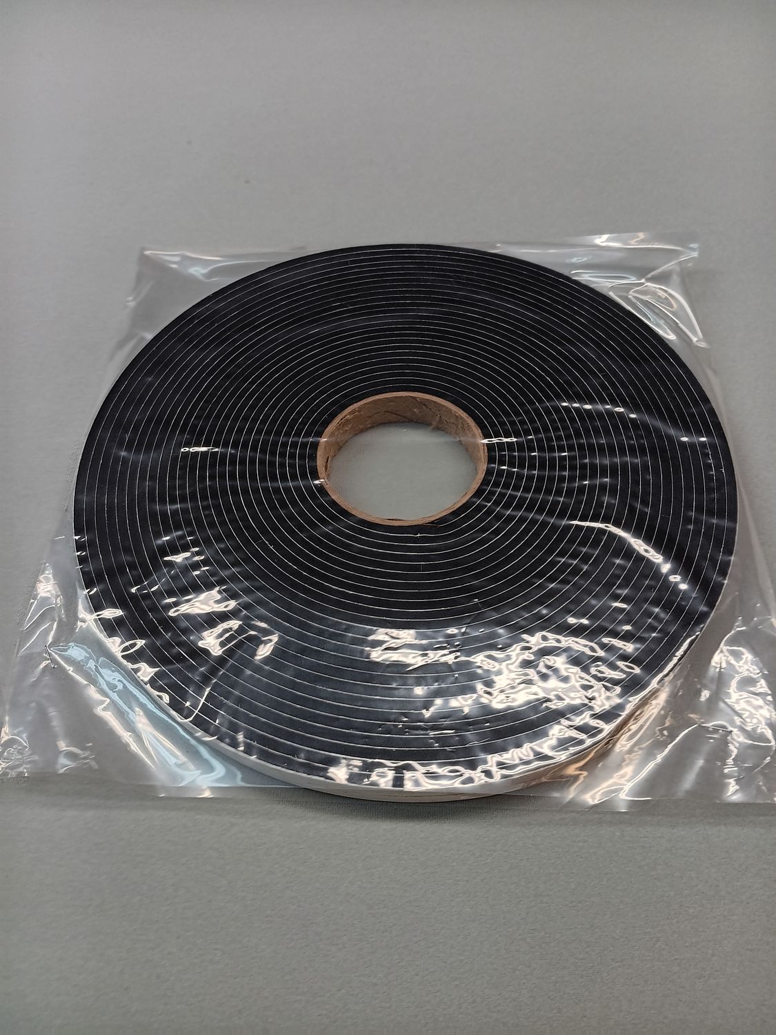 Closed-Cell Neoprene Tape – 3/8" x 3/16" x 100' Roll for Vacuum Hold-Down Applications (VT100)