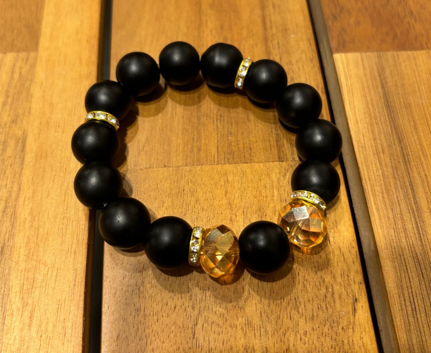 BLACK BEADED BRACELET (GOLD ACCENTS)