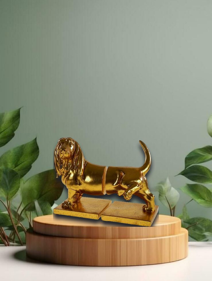S/2 tlg. Buchstütze Dackel, gold