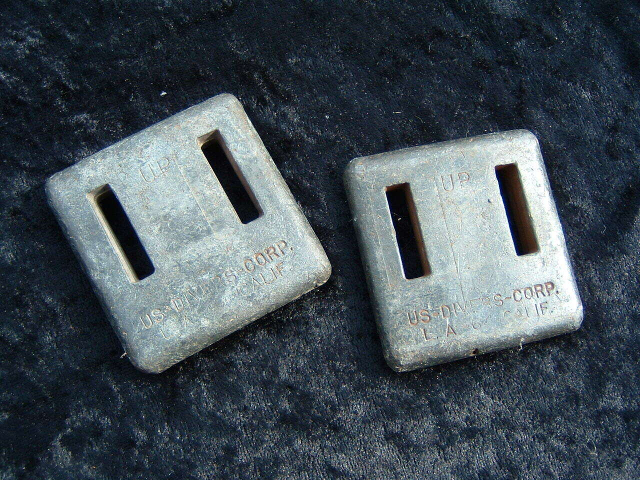 US Divers VERY early one pound weights STAMPED NOT CAST WITH NAME.