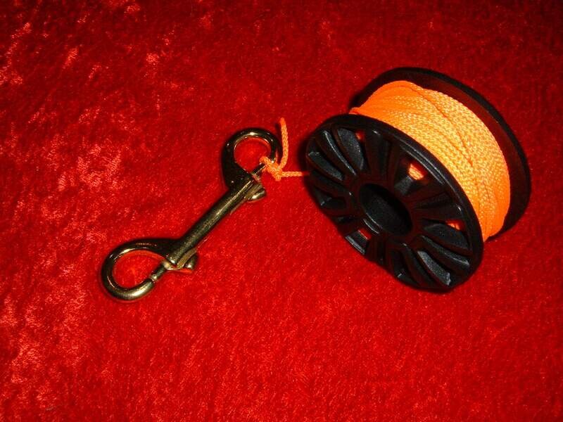 Reel or spool  with 100' line and brass double ender NEW IN PACKAGE.