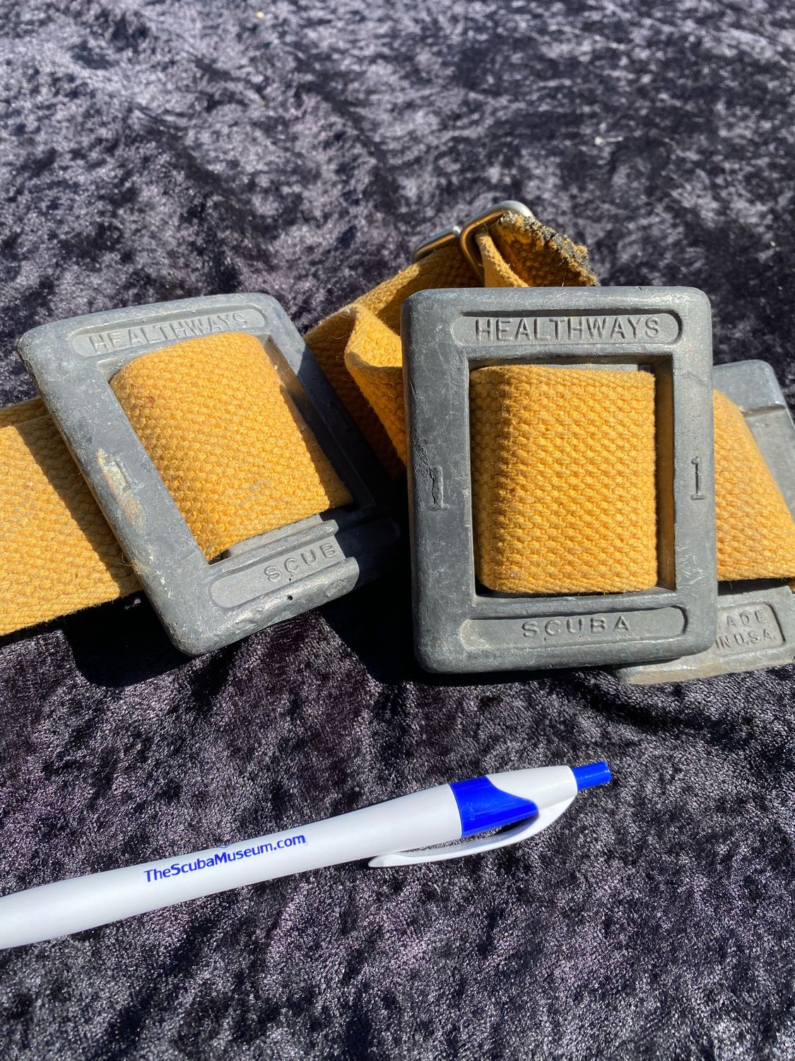 Healthways early one pound weights with two inch belt and wire buckle.