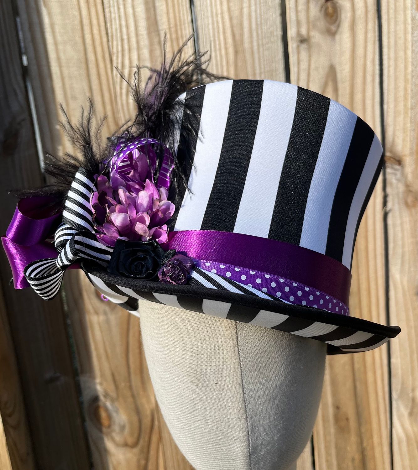 Black and white striped top hat/purple accent