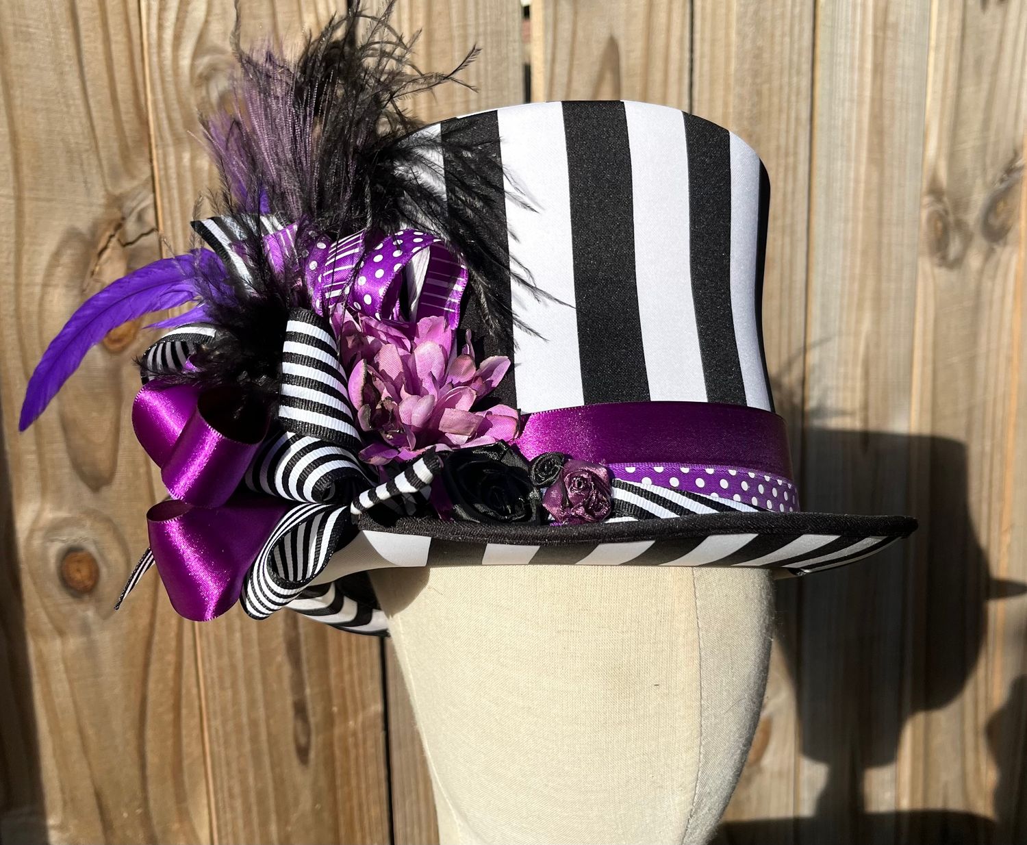 Black and white striped top hat/purple accent