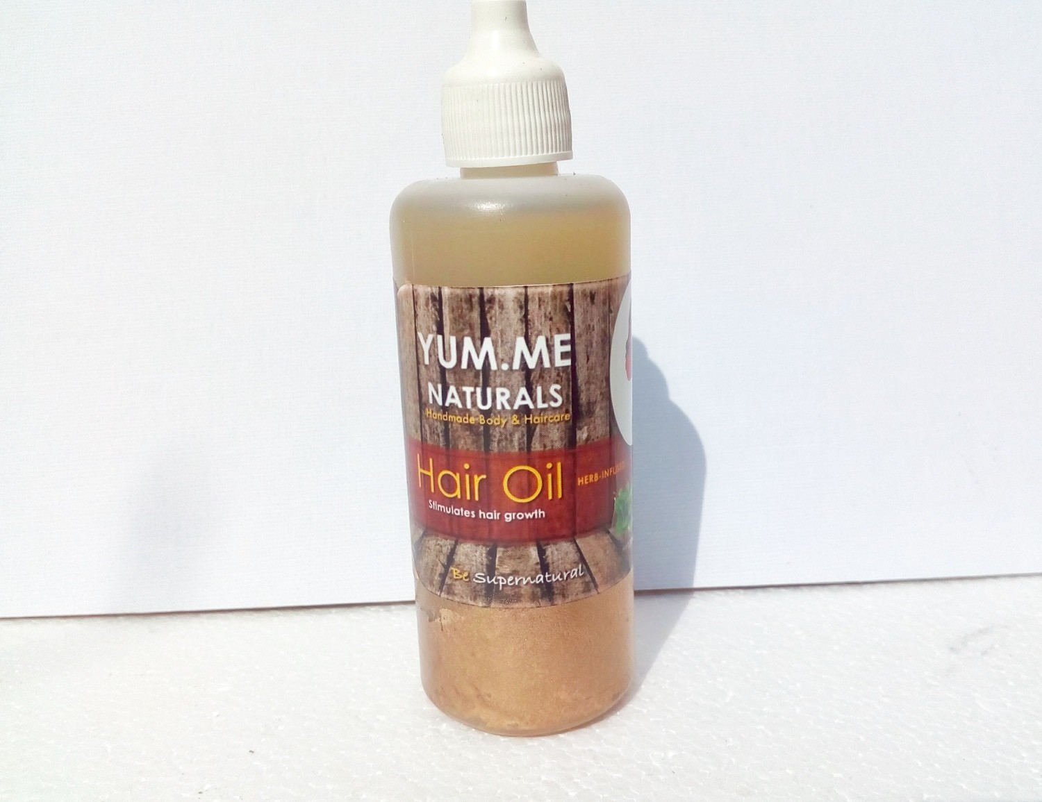 Herb-infused hair oil