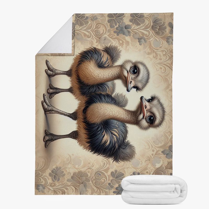 Beige cuddly blanket with an ostrich motif