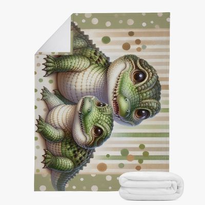 Green/beige cuddly blanket with crocodile motif