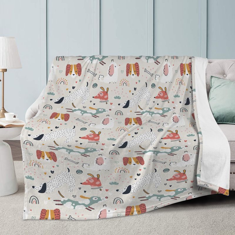 Adorable cuddly blanket with dogs
