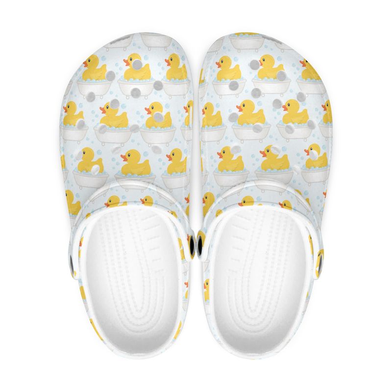Funny rubber ducks in bathtub clogs