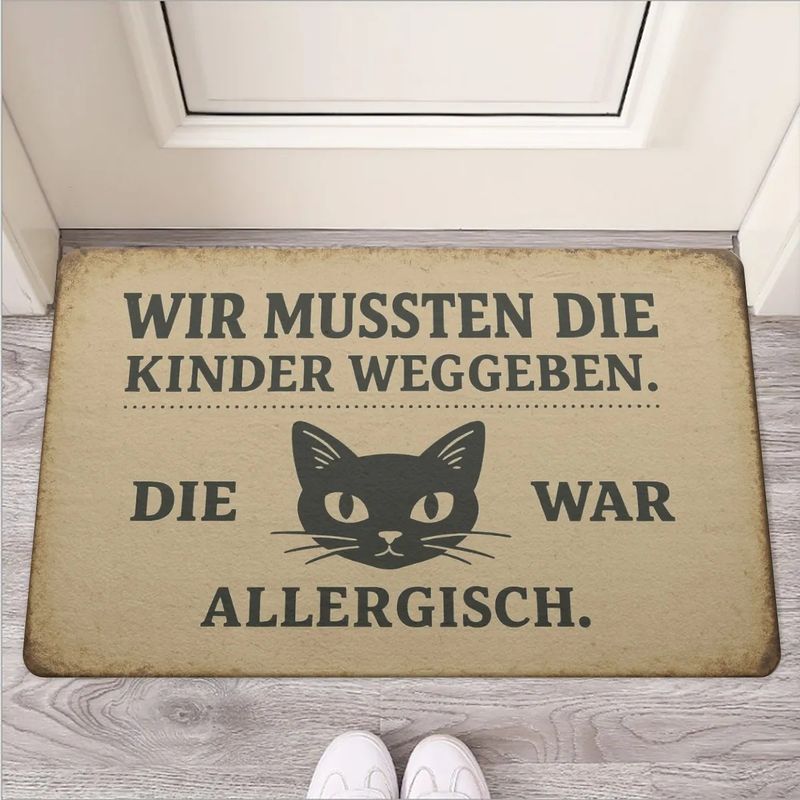 Doormat &quot;We had to give the kids away. The cat was allergic.&quot;