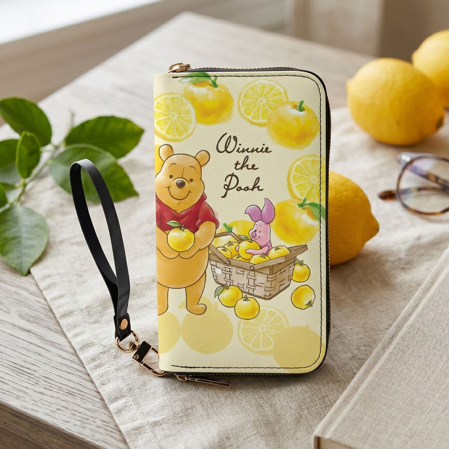 Lemon-colored Winnie the Pooh wallet with carrying strap