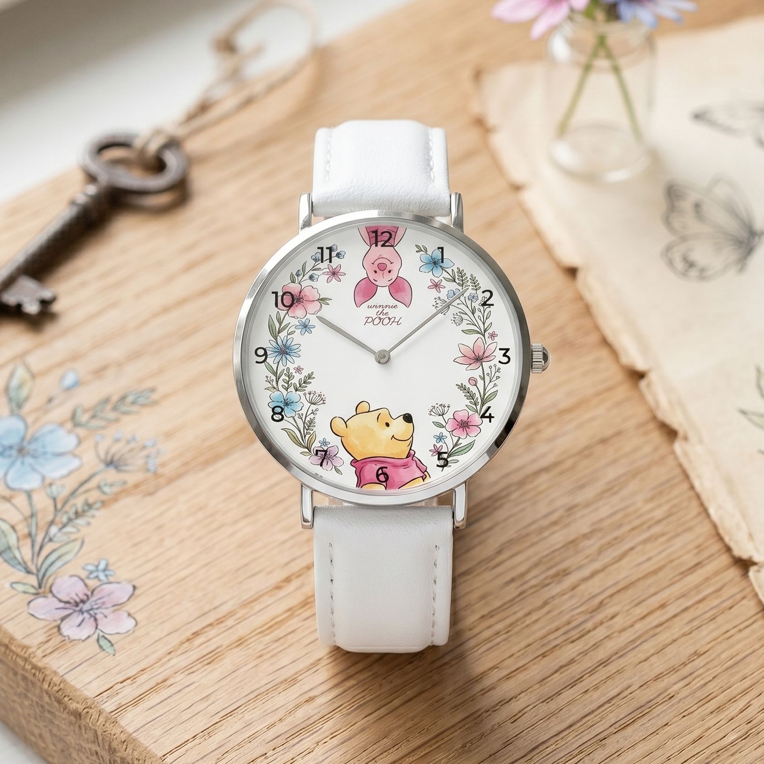 Winnie the Pooh leather wristwatch with flower wreath, silver