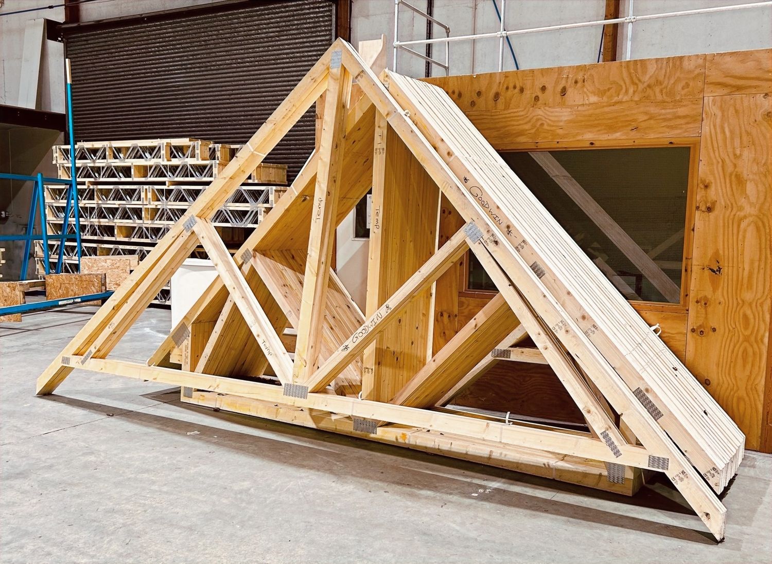 Representative photo: 40-ft roof truss · project specified