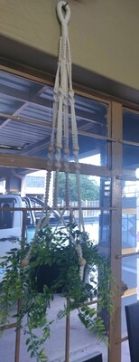 Macrame with black glass ceramic  bucket and artificial fern.
