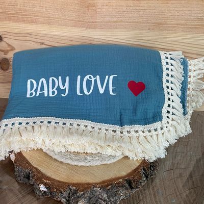 Couverture bleue en gaz de coton