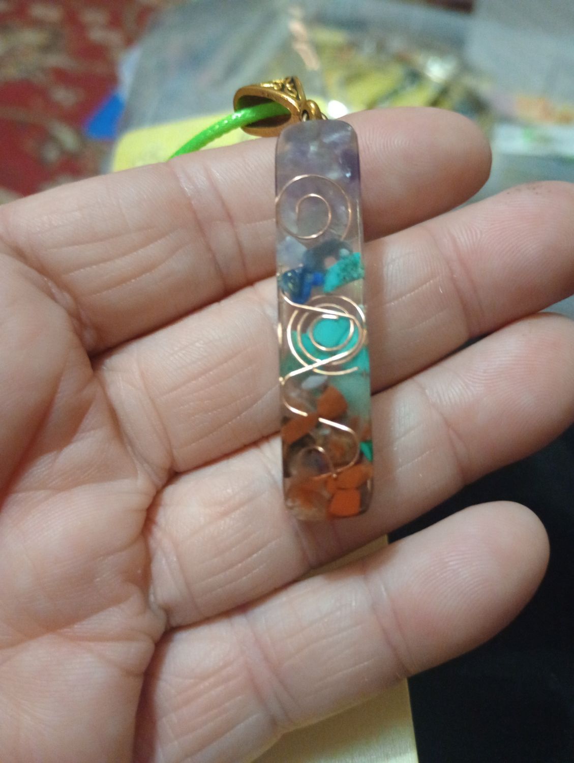 7 chakra resin pendant with wax cord