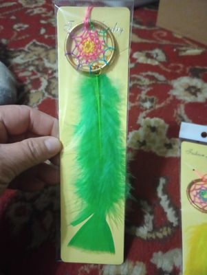 Dreamcatcher, gold and green - represents Compassion