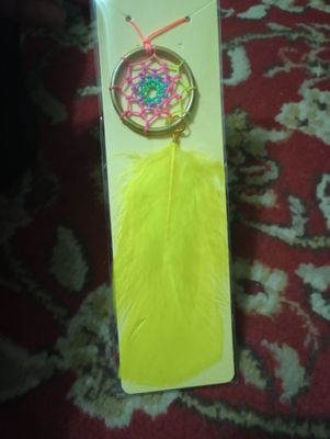 Dreamcatcher, gold and yellow, represents Beauty