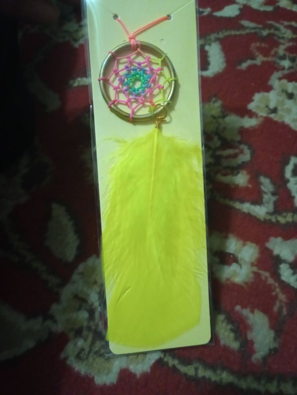 Dreamcatcher, gold and yellow, represents Beauty