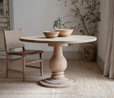 Laya round carved mango wood table small