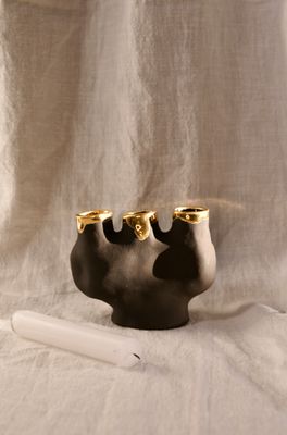Brown candleholder for three