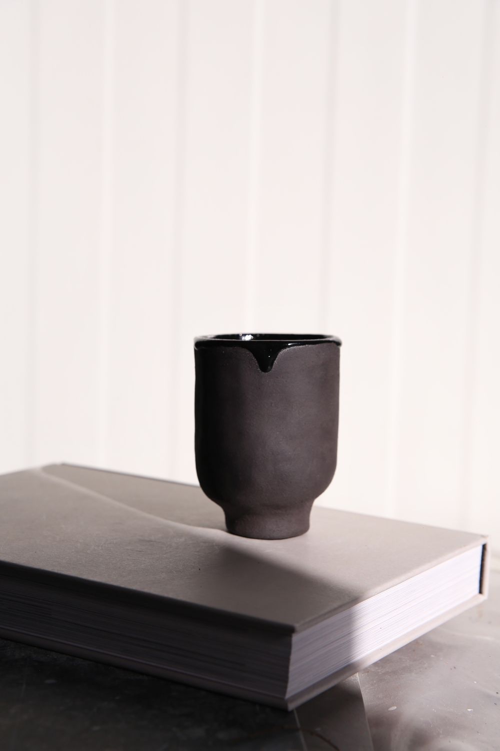 Black dripping mug