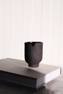 Black dripping mug