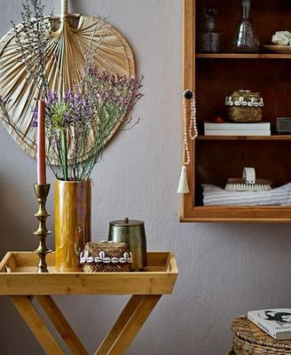 Various decorative ethnic items displayed in a living room