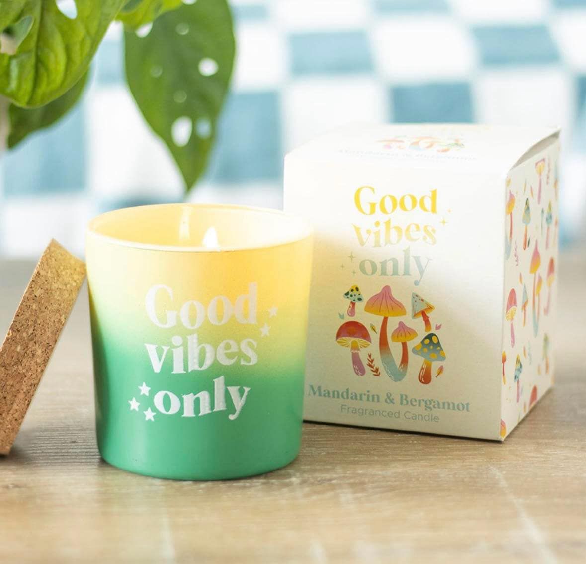 Fill the home with fresh fragrance and positive vibes with this Mandarin and Bergamot scented candle. Crafted in a coloured glass pot in vibrant shades of green, it&#39;ll add a pop of colour to any livin