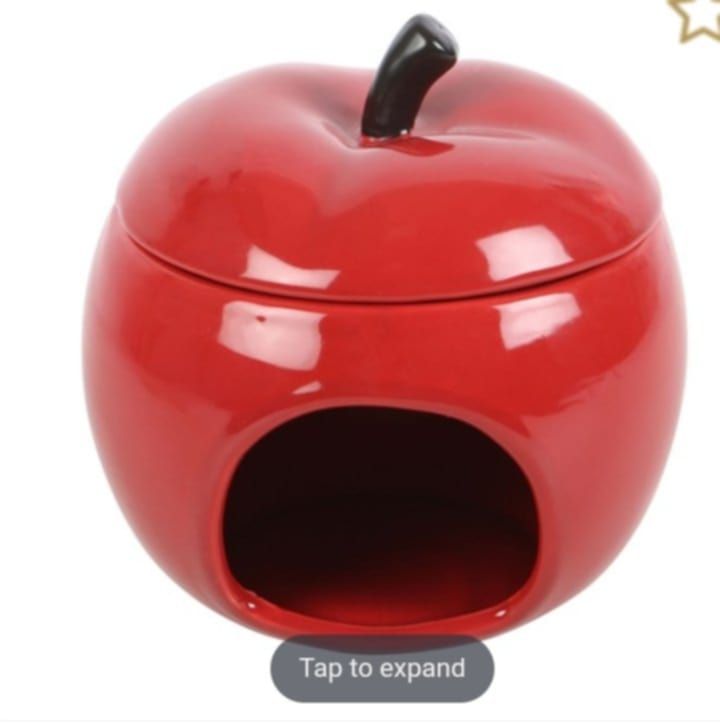 This juicy, red apple oil burner is the perfect way to fragrance the home with a touch of whimsy. Its playful design makes it both a functional and eclectic decor piece. Recommended for use with fragr