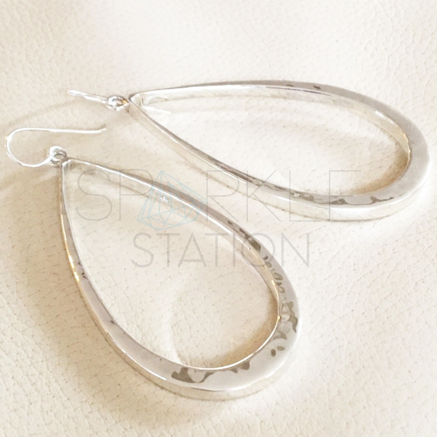 ichu jewellery sterling silver large open tear earrings