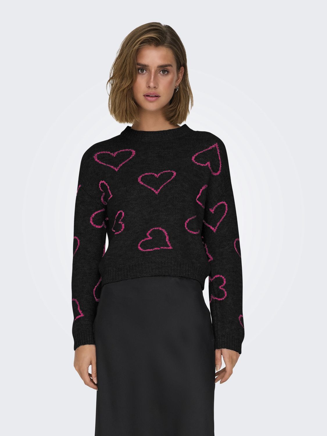 Only Pull tricot col rond noir motifs coeur fuschia 15335027