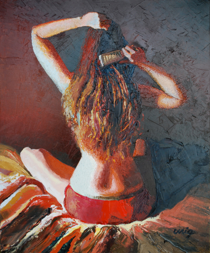 Woman combing her hair