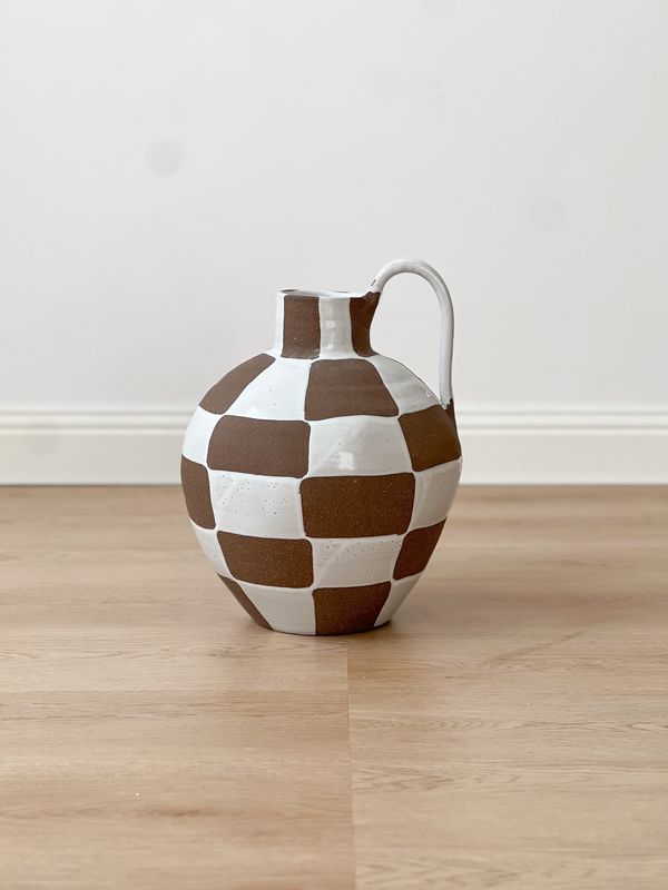 brown and white ceramic vase