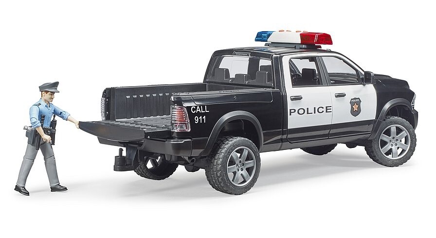 Pickup de police RAM 2500 avec policier