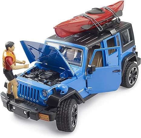 Jeep Wrangler Rubicon Unlimited avec kayak et kayakiste