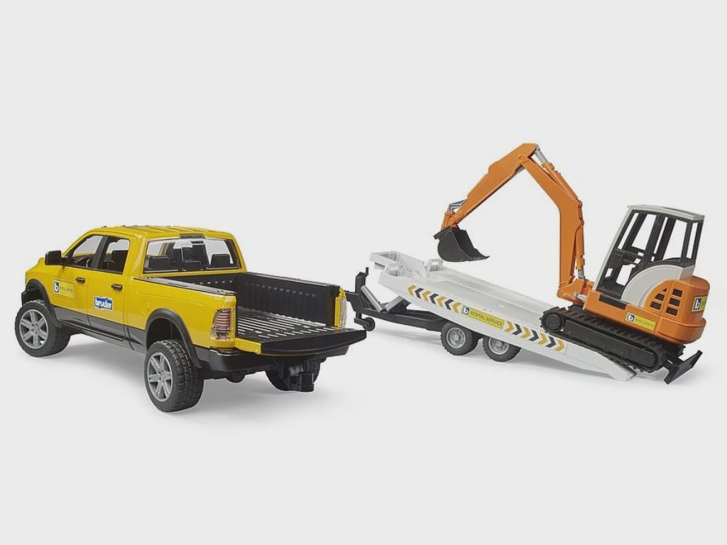 Pickup RAM avec remorque et excavatrice
