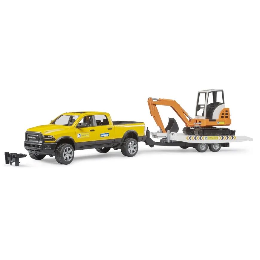 Pickup RAM avec remorque et excavatrice