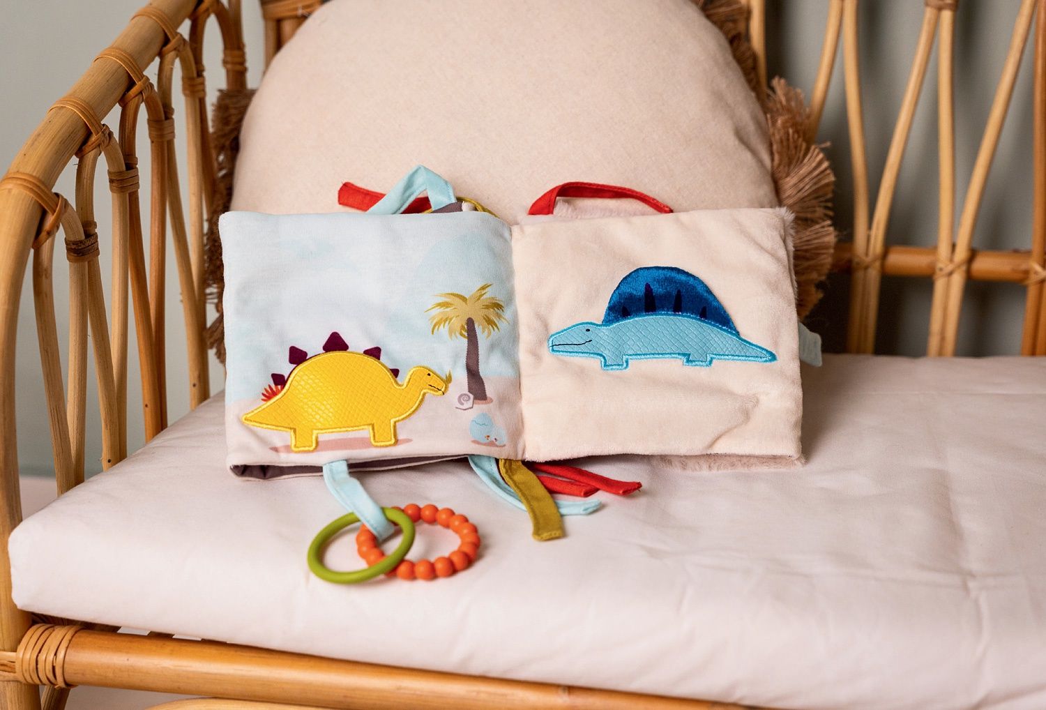 Livre d'éveil en tissu 2-en-1 / Dino