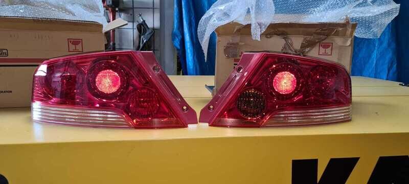 Mitsubishi Evo 7 Rückleuchten EU Version LHD  MR598623 & MR583091