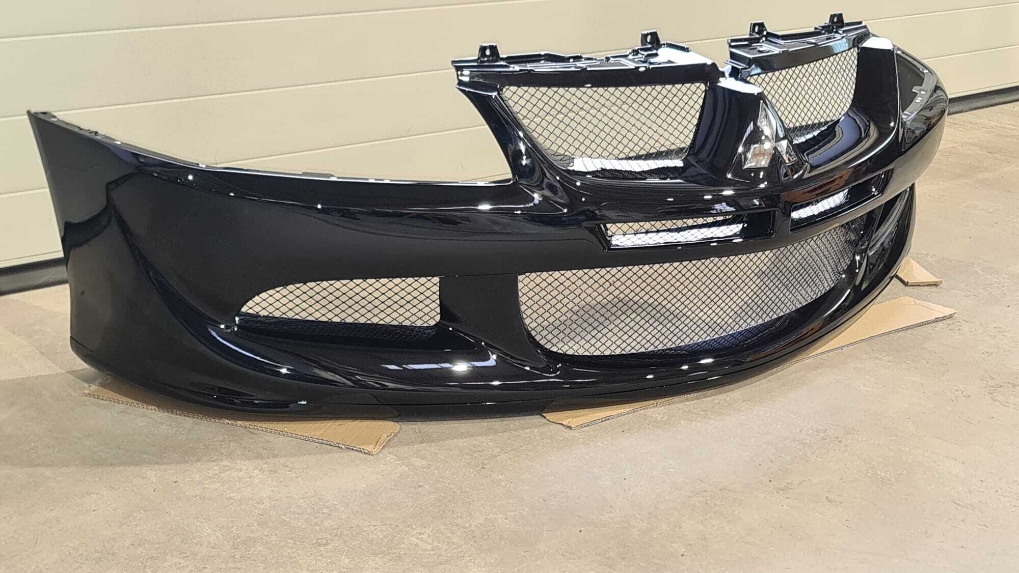 Neue Überholte Evo 8 Stoßstange komplett mit Gitter