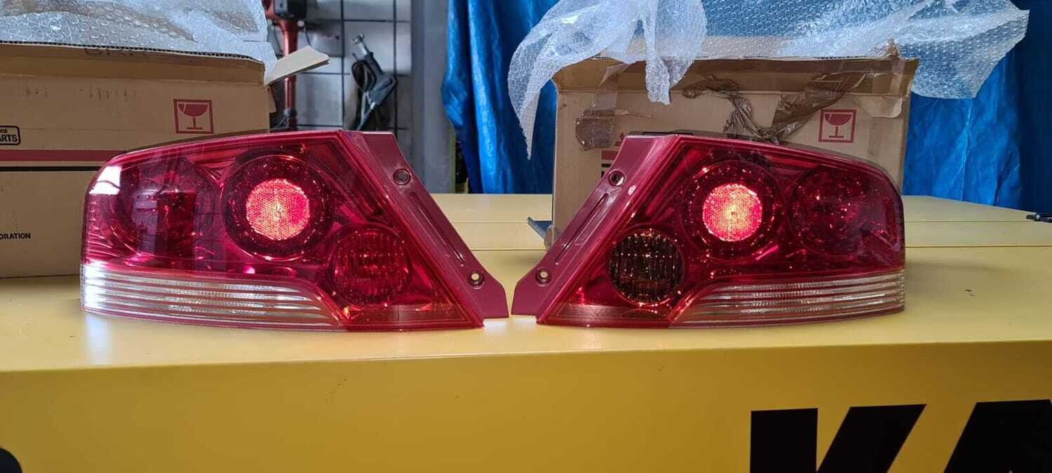 MR598623/MR583091  - Rückleuchten EU Version - SET - NEU  - EVO 7