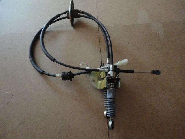 MN107709 + MR581210 - Halter, Schaltzug/Getriebe + Schaltzug (Set) MN107709 + MR581210 - Halter, Schaltzug/Getriebe + Schaltzug (Set)