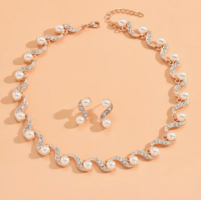 3- Item Combo Neck Elegance for 10 OMR
Wave Shape Choker Necklace &amp; Drop Earrings for Party + Hollow Flower Choker Necklace &amp; Drop Earrings + Golden Heart-shaped Pendant and Necklace