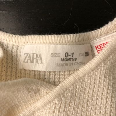Zara Onesie White diagonal buttons
